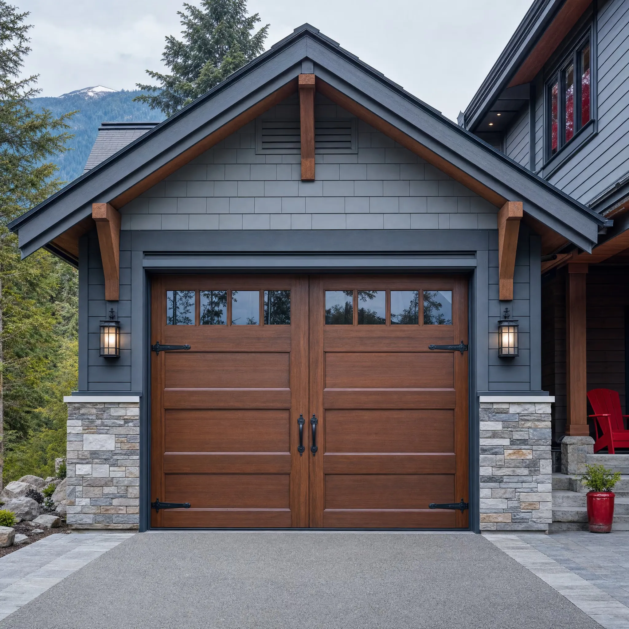 A carriage-style wood-look garage door with strap hinges on a traditional craftsman home